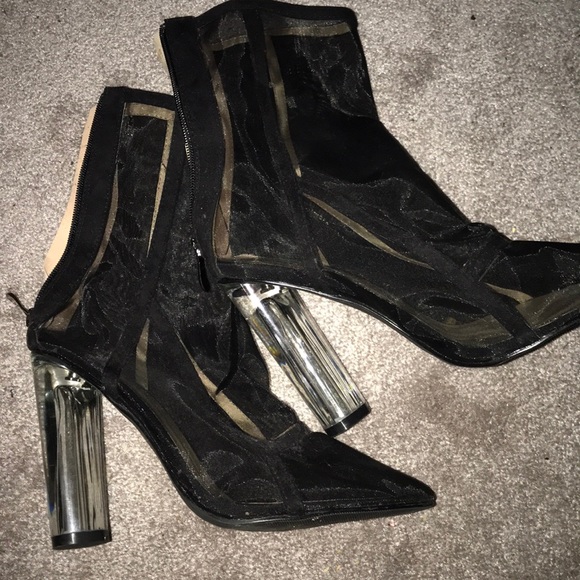 black shoes with glass heels